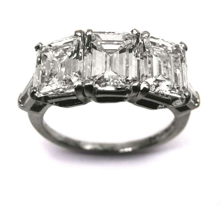 Three stone rectangular cut diamond ring